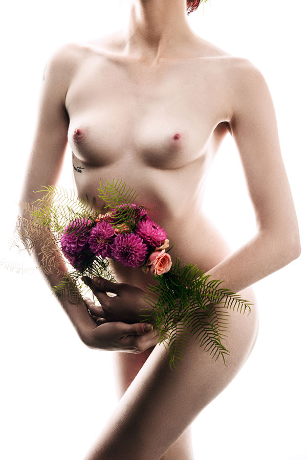 Fine Art Nude photography training - model holding flowers - Lindsay Adler Photography